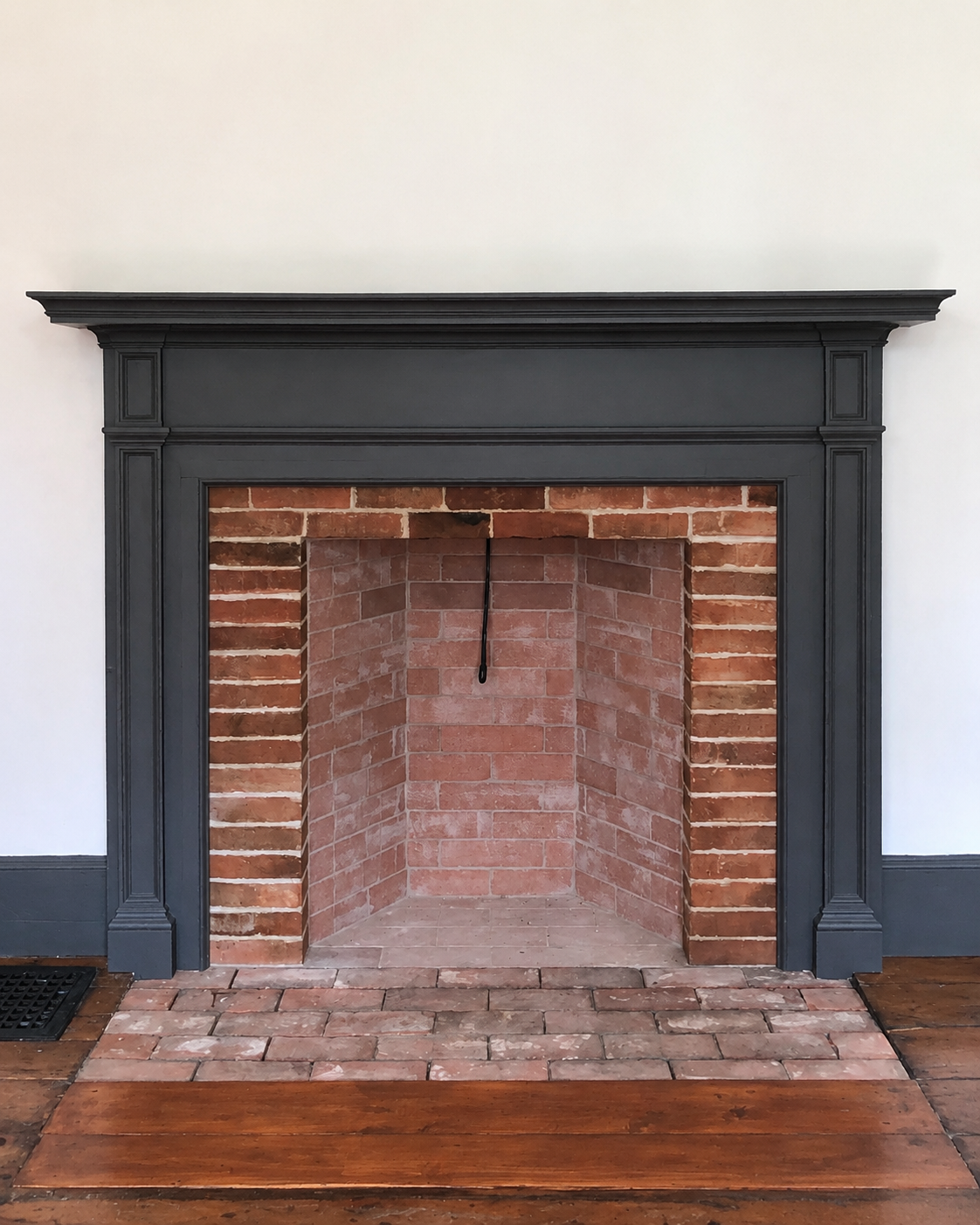 Finished brick fireplace and hearth by CDK Masonry