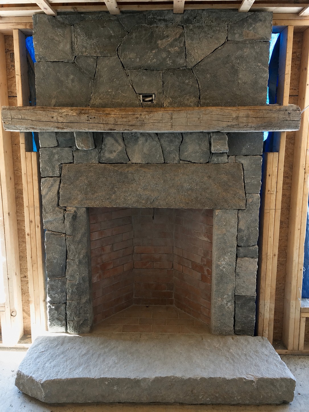 Stone Rumford fireplace and brick chimney in Medway Massachusetts